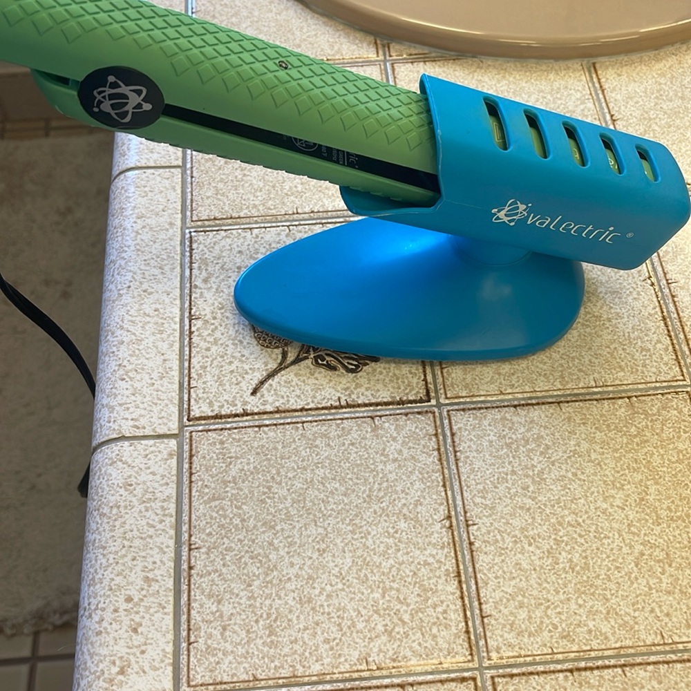 Valectric flat iron and holder